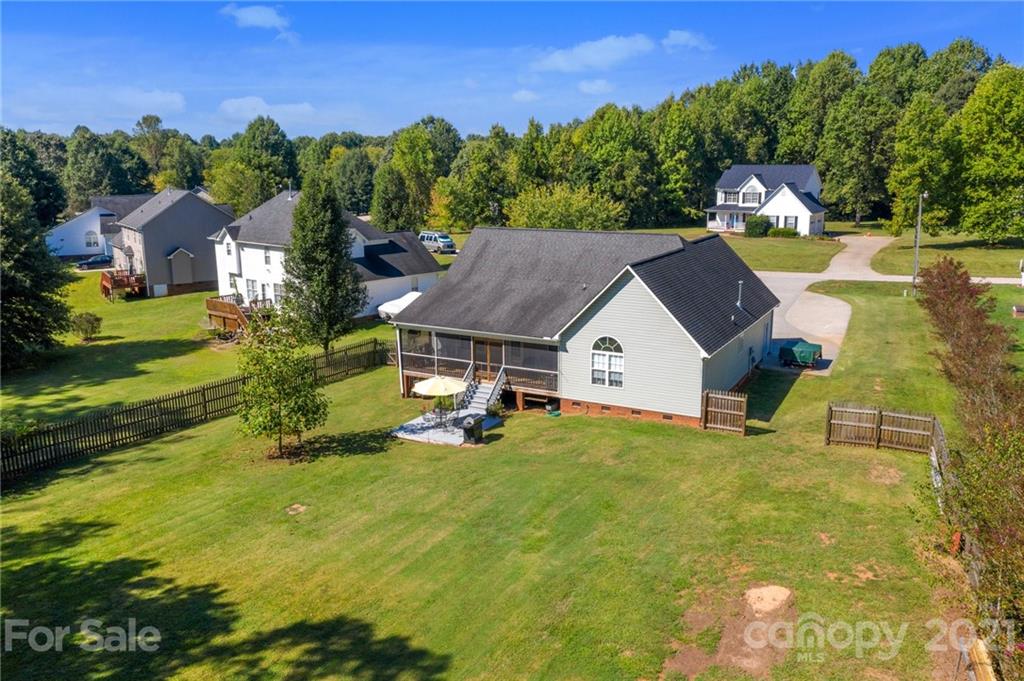 638 Maple Ridge Circle Salisbury, NC 28147 - Photo 13 of 48 a view of a house with a big yard