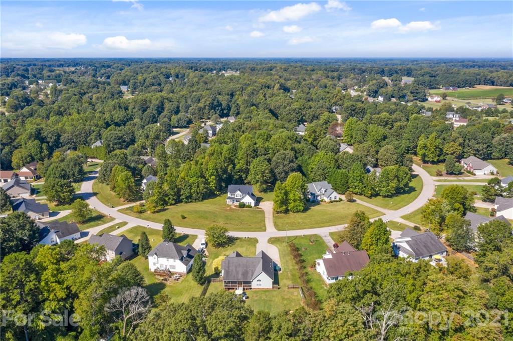 638 Maple Ridge Circle Salisbury, NC 28147 - Photo 17 of 48 an aerial view of residential houses with outdoor space and trees