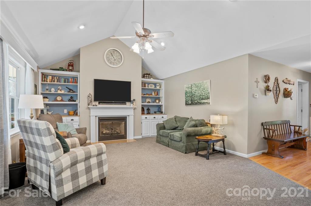 638 Maple Ridge Circle Salisbury, NC 28147 - Photo 23 of 48 a living room with furniture and a fireplace