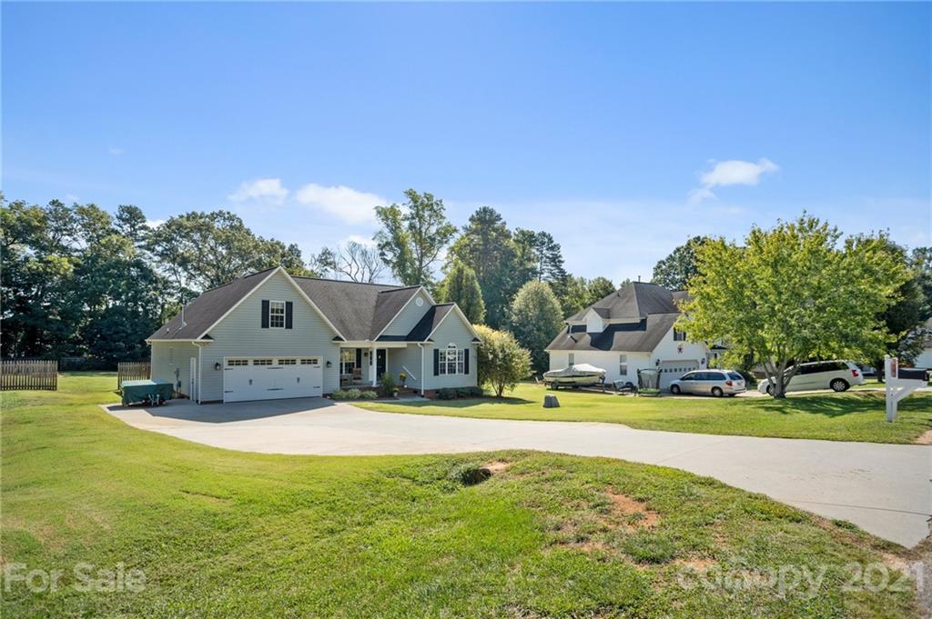 638 Maple Ridge Circle Salisbury, NC 28147 - Photo 3 of 48 a view of a house with a big yard