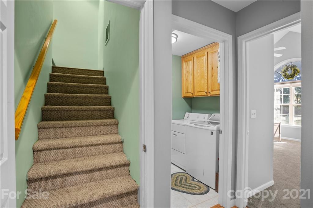 638 Maple Ridge Circle Salisbury, NC 28147 - Photo 38 of 48 a view of entryway with wooden floor and stairs