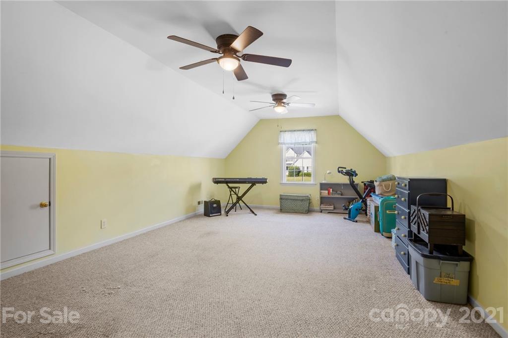 638 Maple Ridge Circle Salisbury, NC 28147 - Photo 39 of 48 a view of a livingroom with furniture and a ceiling fan