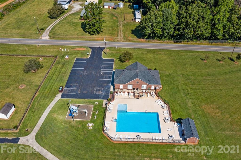 638 Maple Ridge Circle Salisbury, NC 28147 - Photo 44 of 48 a view of swimming pool with a garden