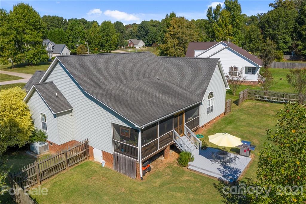 638 Maple Ridge Circle Salisbury, NC 28147 - Photo 6 of 48 an aerial view of a house with swimming pool next to a yard