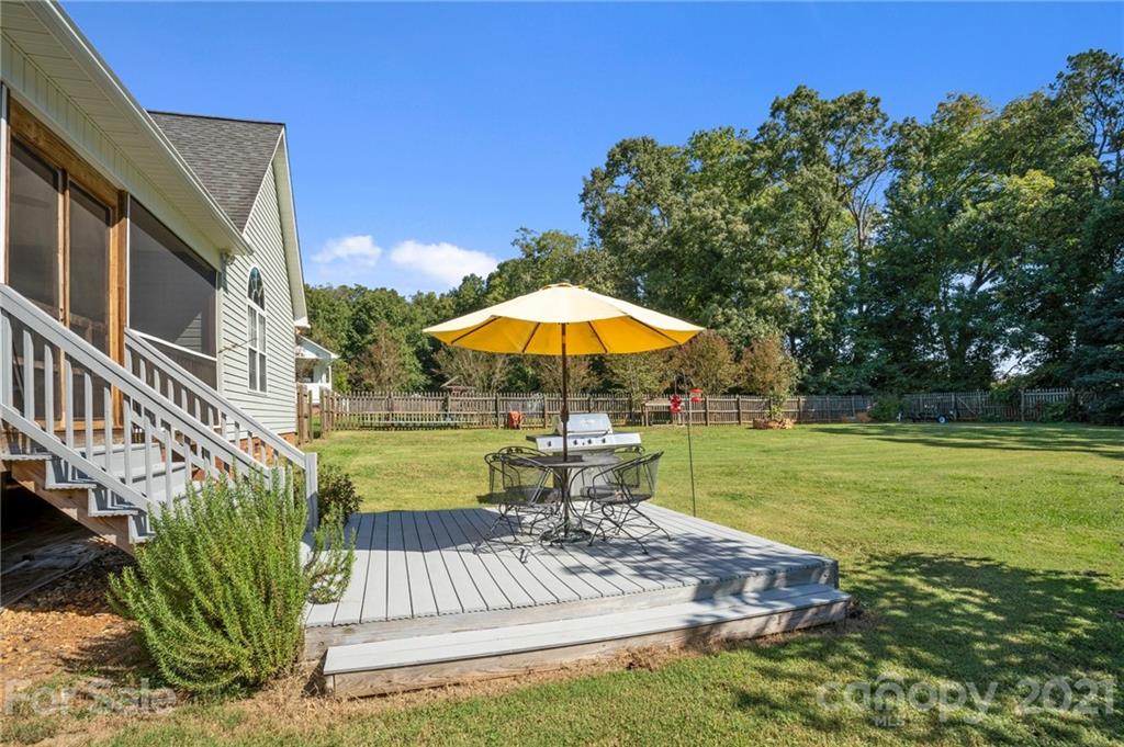 638 Maple Ridge Circle Salisbury, NC 28147 - Photo 7 of 48 a view of a swimming pool with a patio