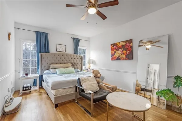 a bedroom with a bed and furniture