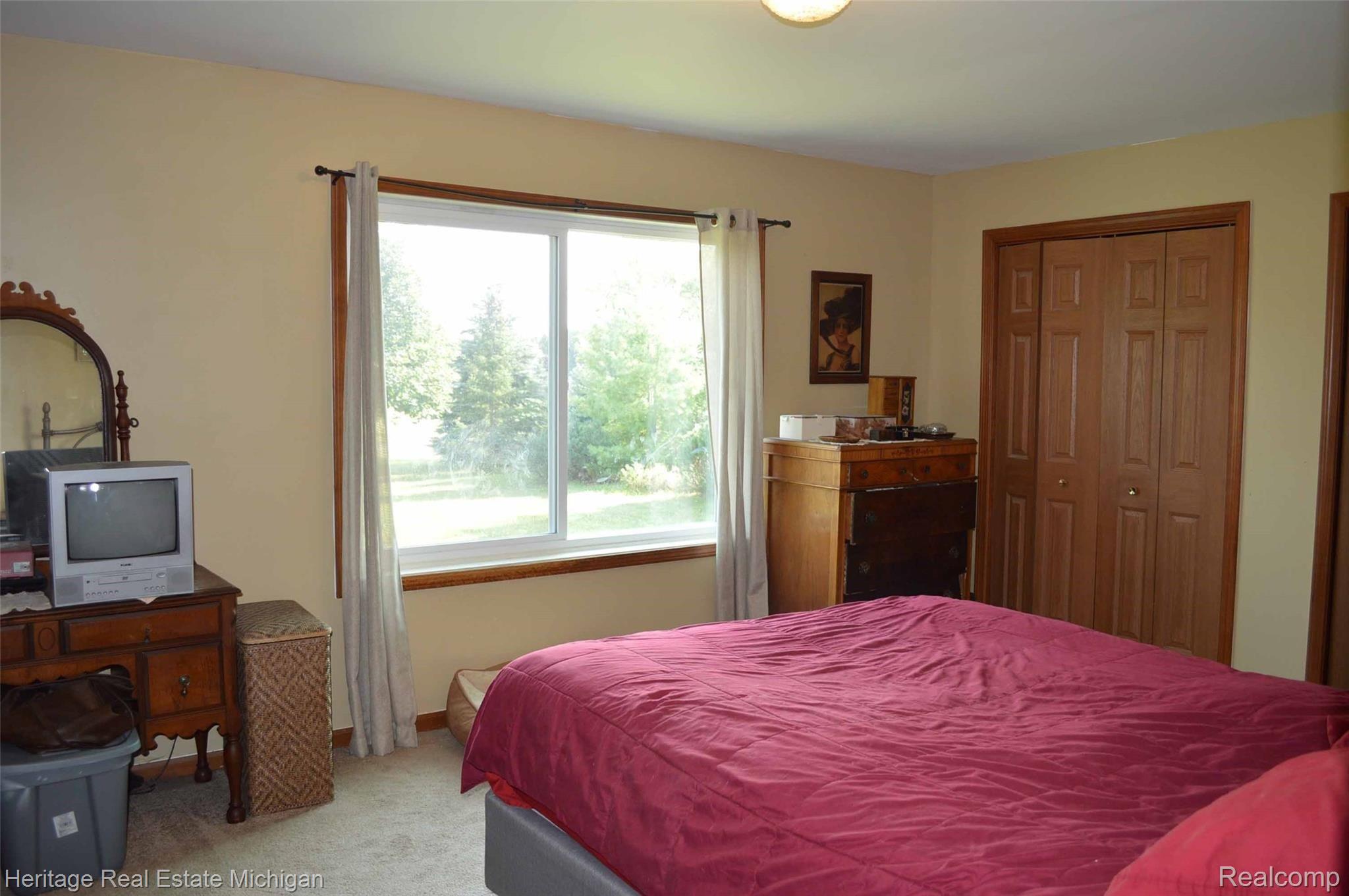 285 North Hughes Road Howell, MI 48843 - Photo 8 of 13 1st floor Owners Suite