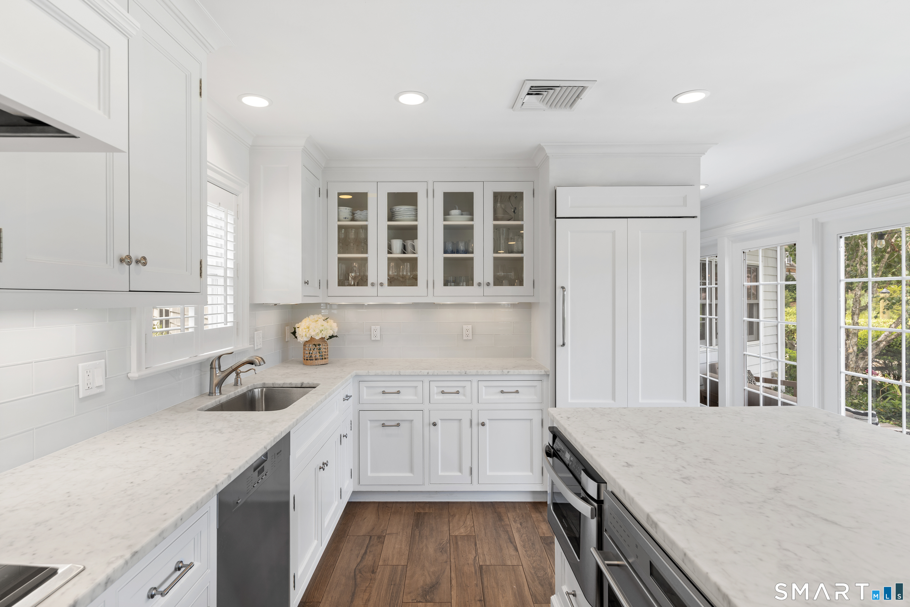 61 5 Mile River Road Darien, CT 06820 - Photo 15 of 38 Subzero Refrigerator and Wolf cooking range and oven