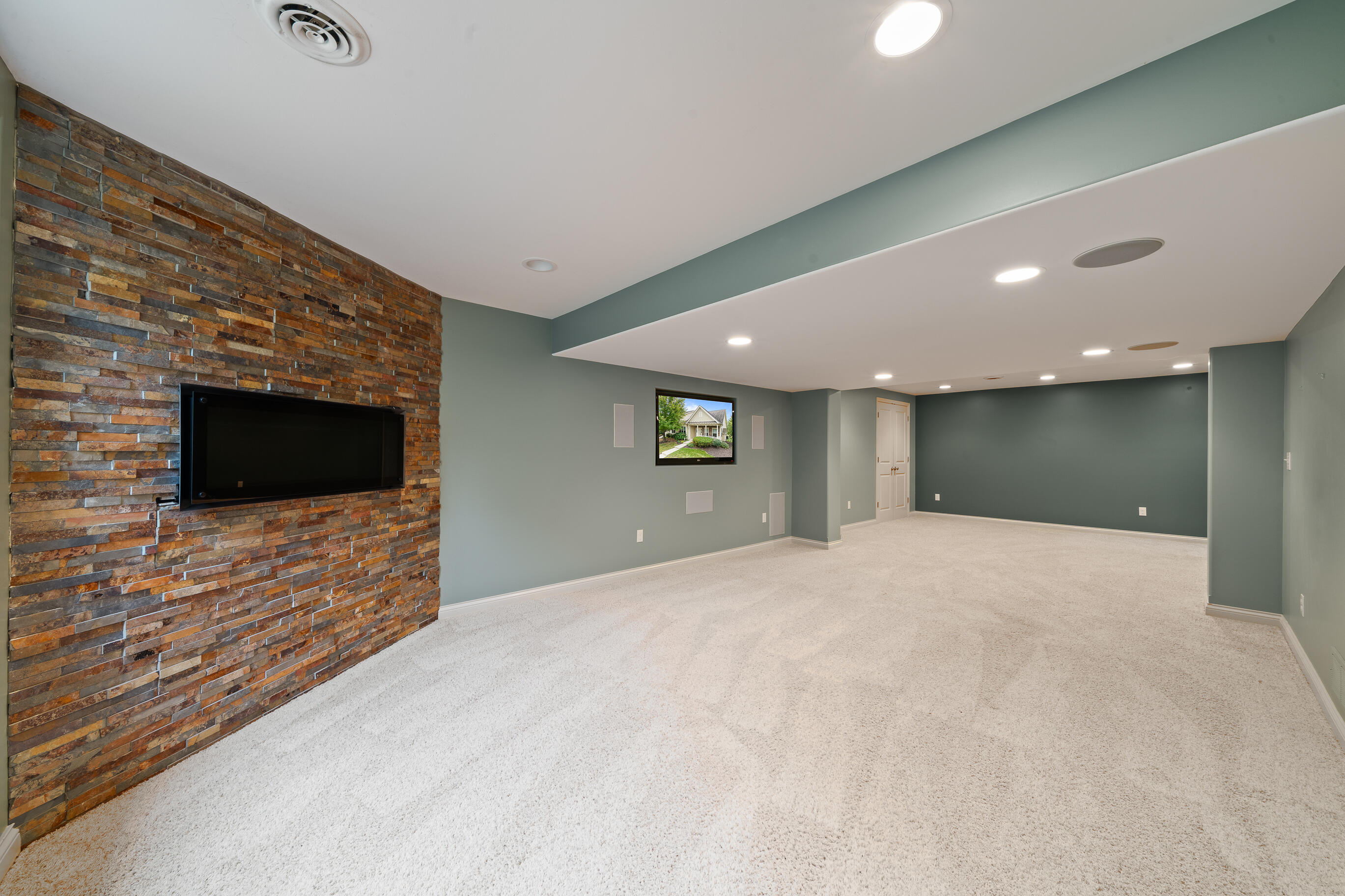 677 Cook Street Walworth, WI 53184 - Photo 33 of 47 Lower Level Family room with fireplace