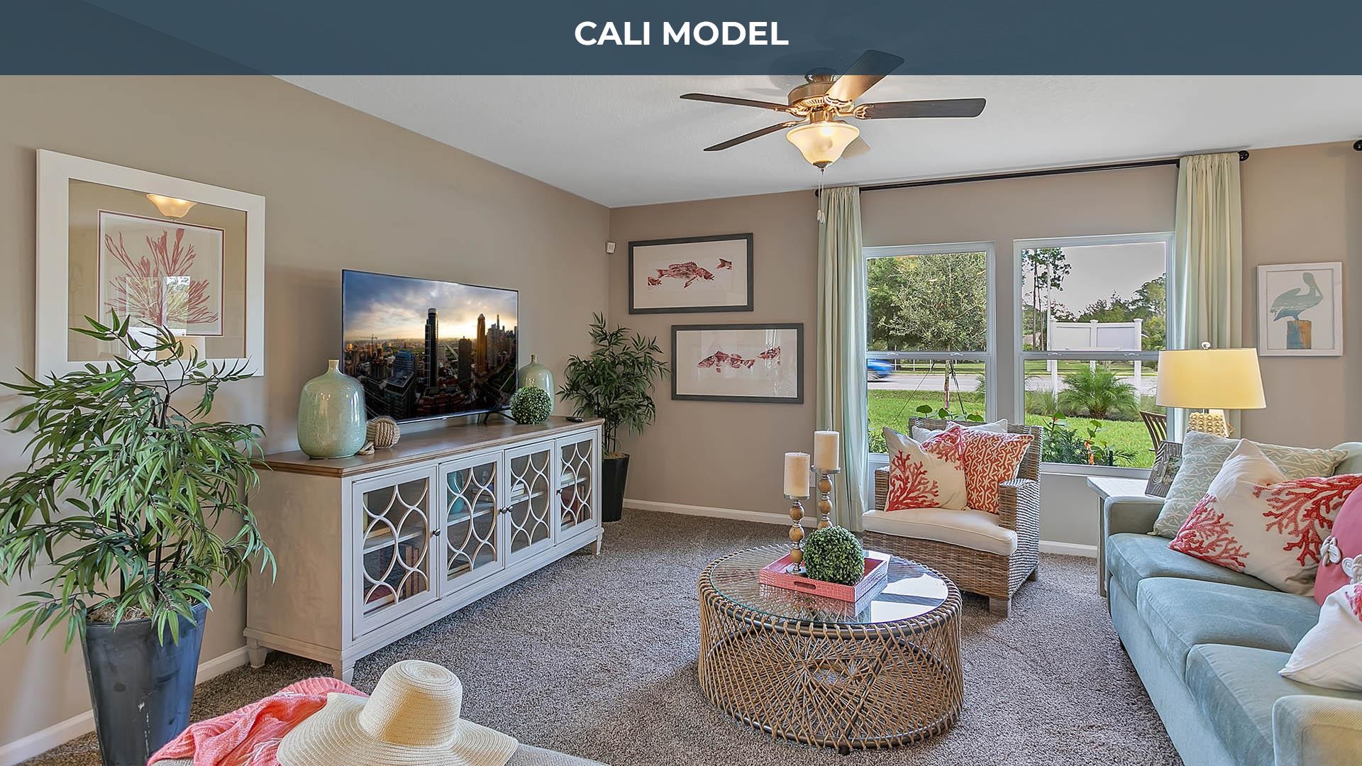 25 Postman Lane Palm Coast, FL 32164 - Photo 6 of 18 a living room with furniture and a flat screen tv