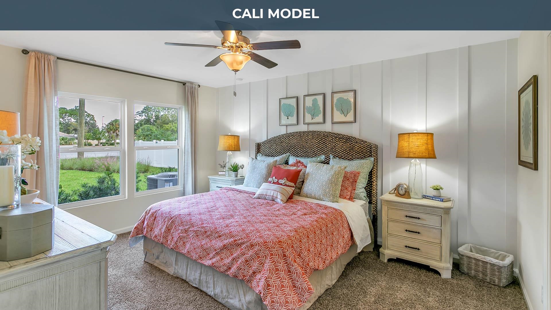 25 Postman Lane Palm Coast, FL 32164 - Photo 7 of 18 a bedroom with a bed next to a window with outer view and couch