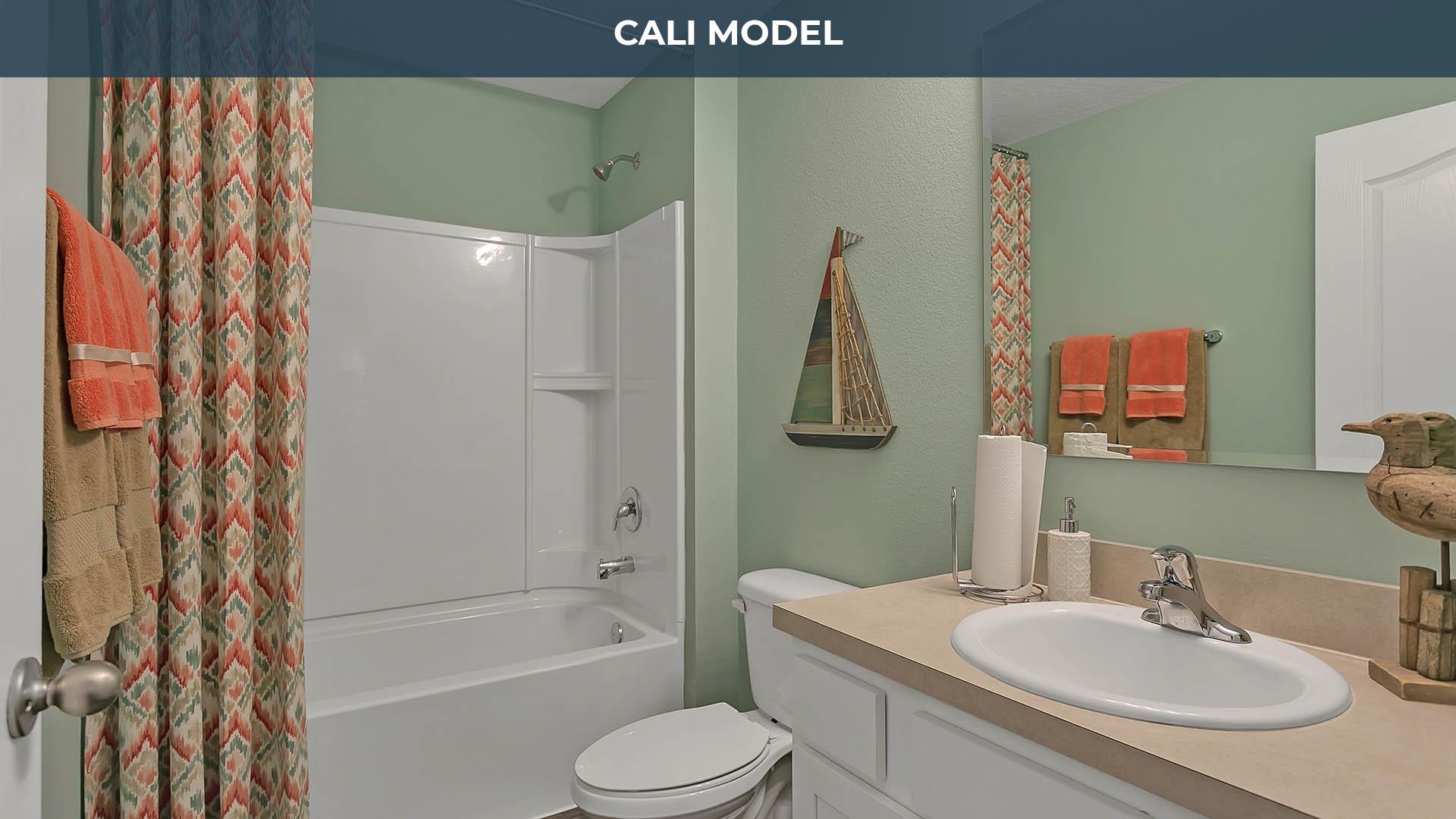 25 Postman Lane Palm Coast, FL 32164 - Photo 10 of 18 a bathroom with a sink toilet and shower