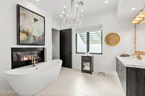 a bathroom with a sink double vanity and a mirror