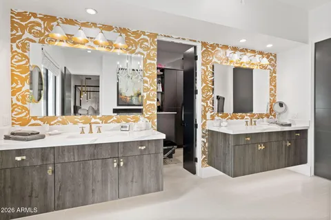 a spacious bathroom with a bathtub and a sink