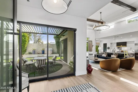 a view of a livingroom with furniture and wooden floor
