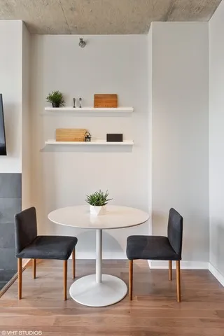 a workspace with furniture and wooden floor