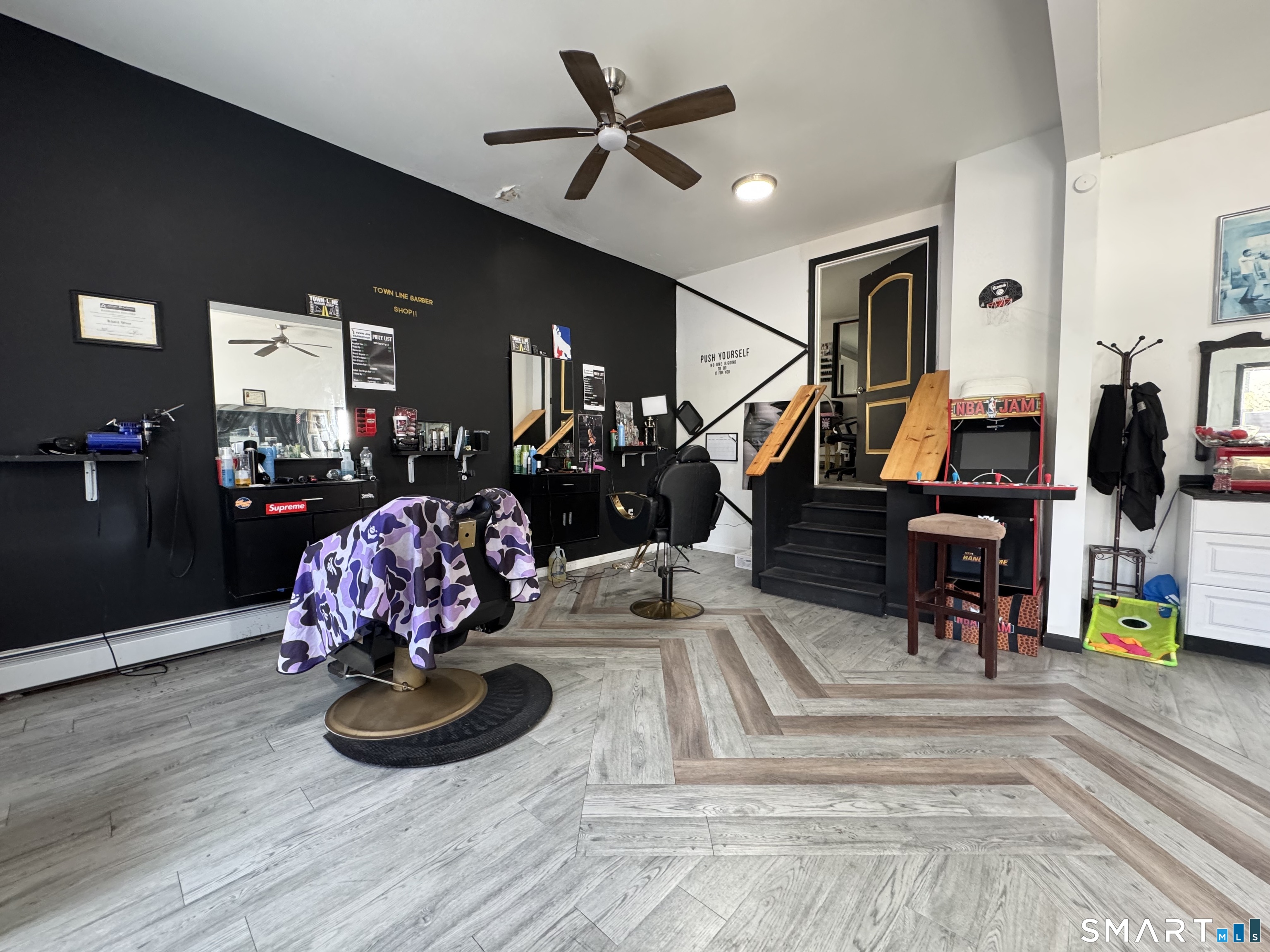 747 Blue Hills Avenue Bloomfield, CT 06002 - Photo 15 of 16 a living room with furniture chess floor and ceiling fan