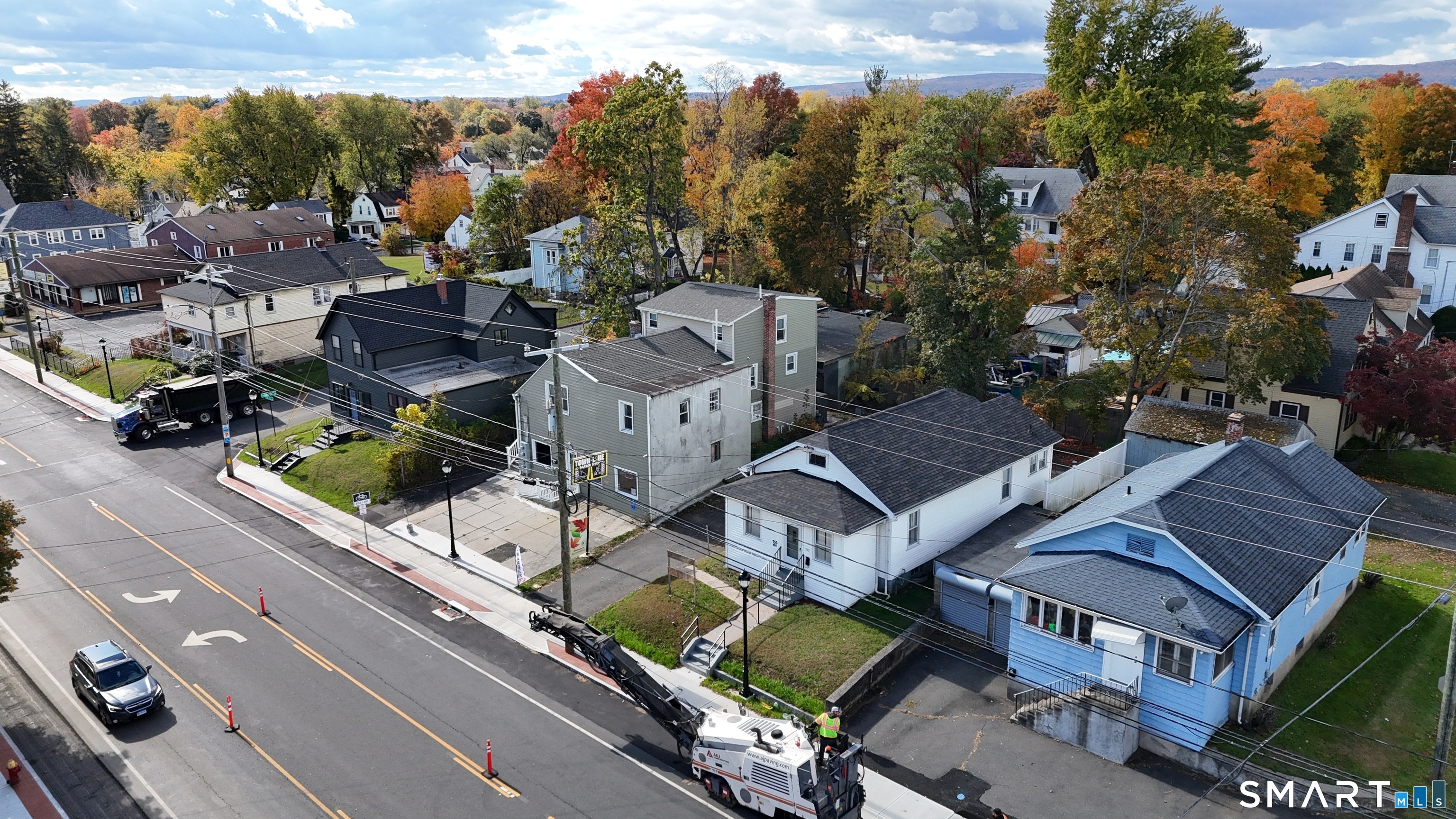 747 Blue Hills Avenue Bloomfield, CT 06002 - Photo 3 of 16 an aerial view of multiple houses with yard