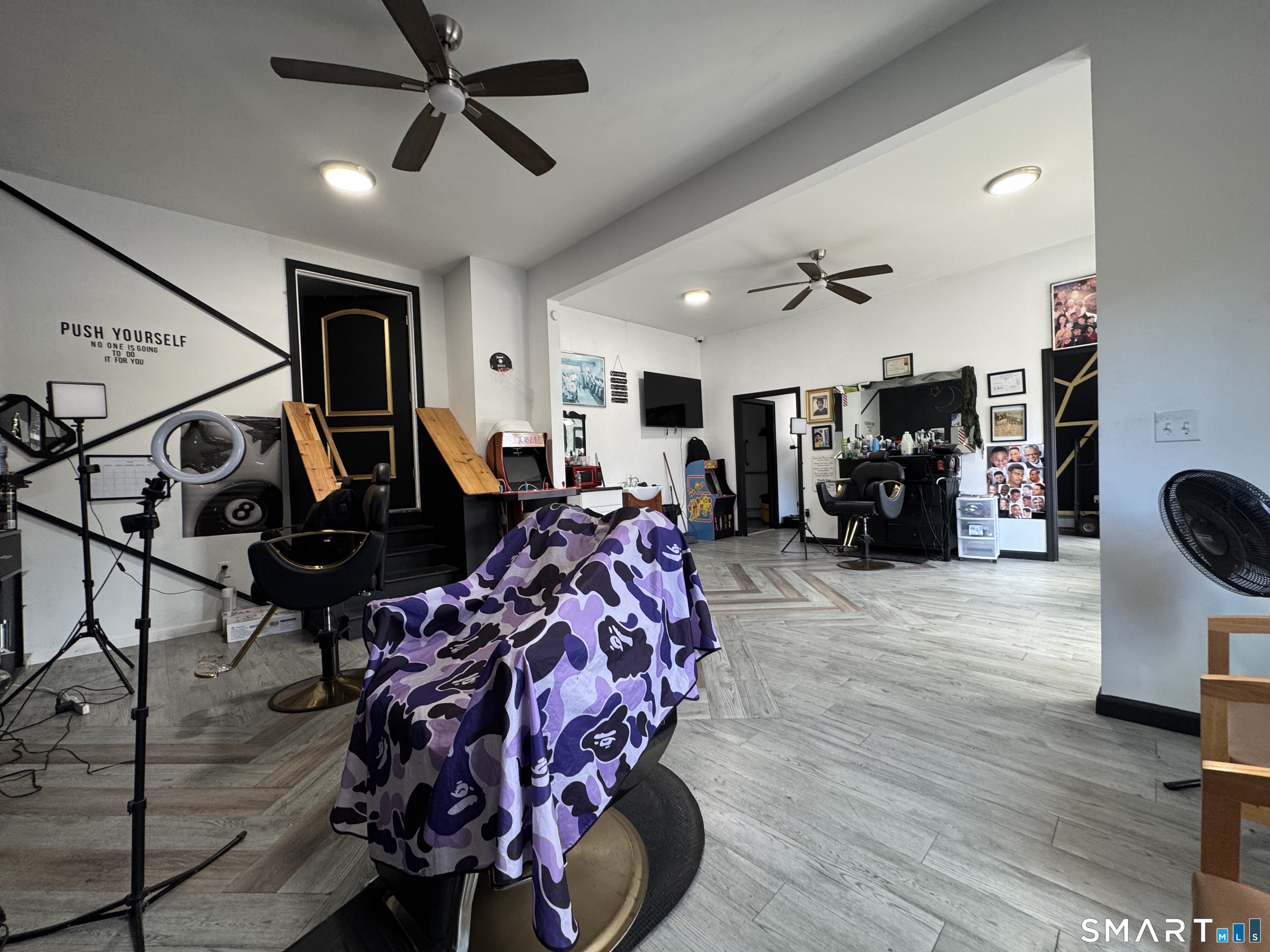 747 Blue Hills Avenue Bloomfield, CT 06002 - Photo 4 of 16 a living room with furniture and a flat screen tv