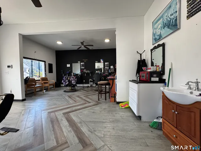 a view of a living room and dining room