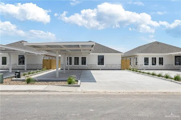 front view of a house with a street