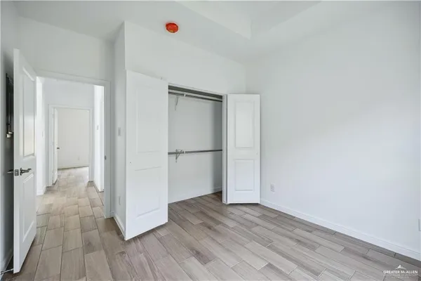a view of a livingroom with wooden floor