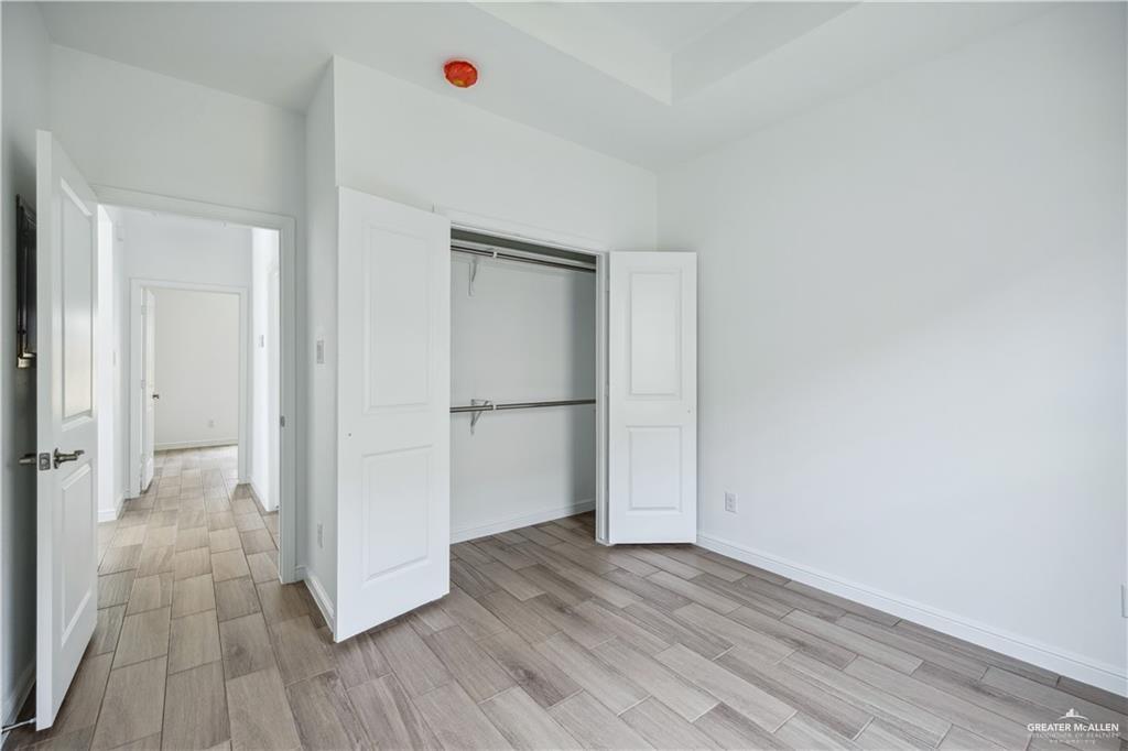 5323 Vision Street, Unit A Rio Grande City, TX 78582 - Photo 5 of 13 a view of a livingroom with wooden floor