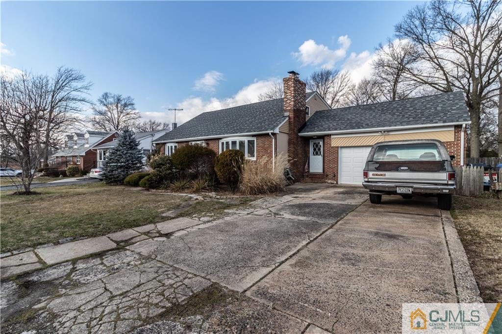 50 Enfield Road Colonia, NJ 07067 - Photo 4 of 31 a car parked in front of house