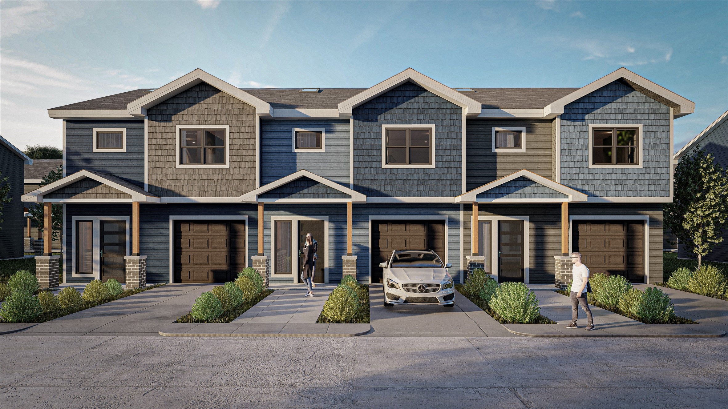 a view of a brick house with many windows plants and large tree