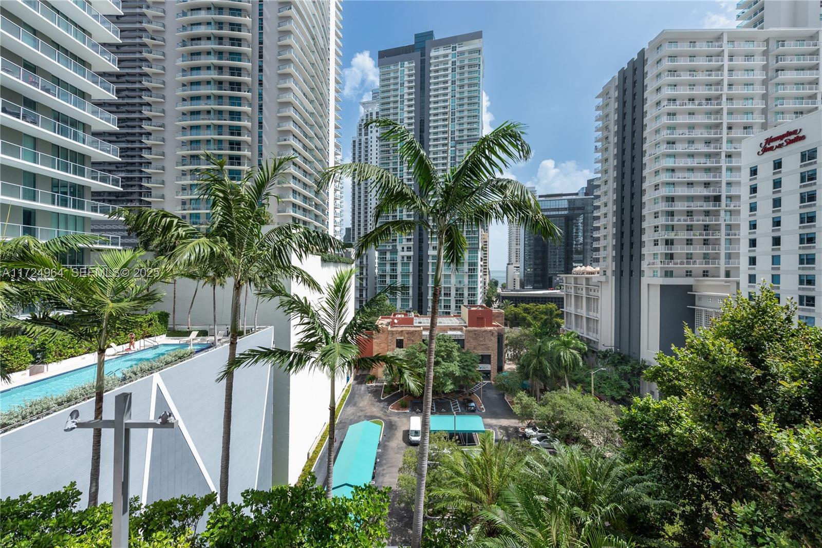 79 Southwest 12th Street, Unit 1107S Miami, FL 33130 - Photo 7 of 26 a view of multi story building with a yard
