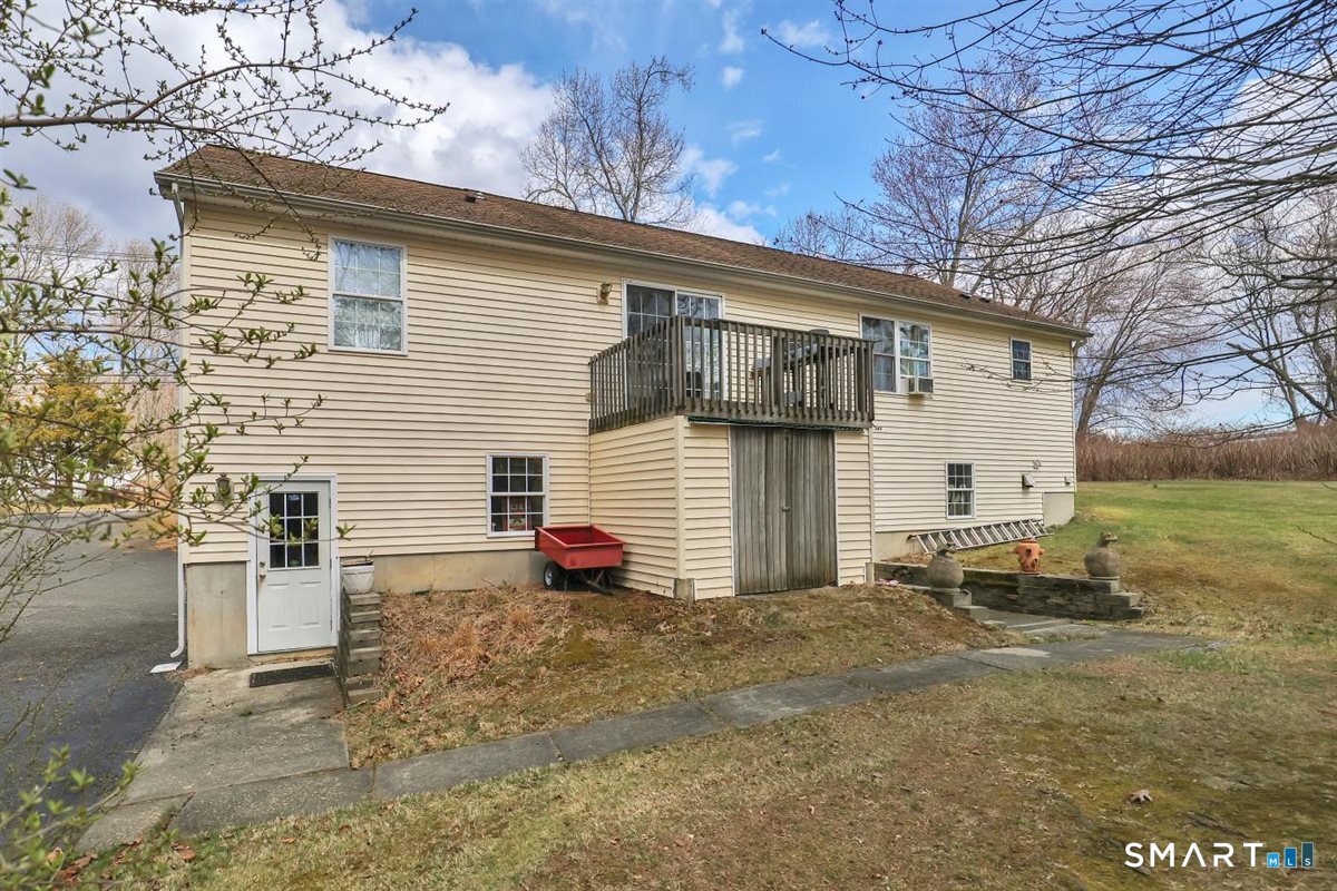 240 Elm Street Old Saybrook, CT 06475 - Photo 24 of 24 a view of a house with backyard