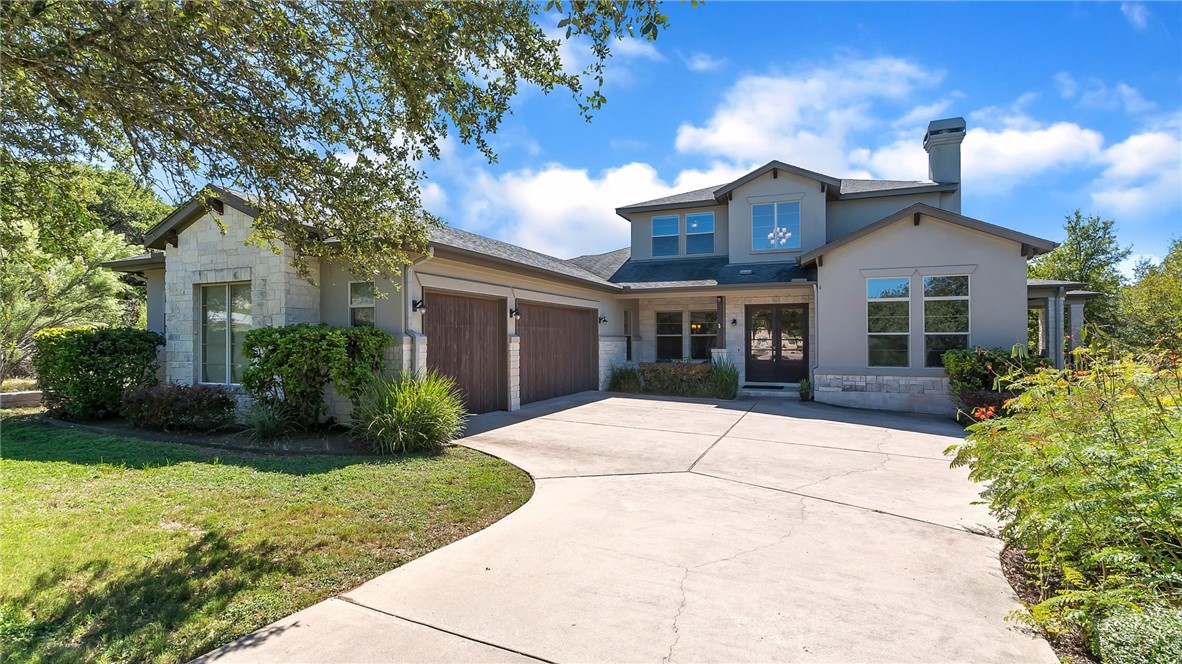 9451 El Rey Boulevard Austin, TX 78737 - Photo 1 of 1 Beautiful, contemporary exterior with 3-car garage.
