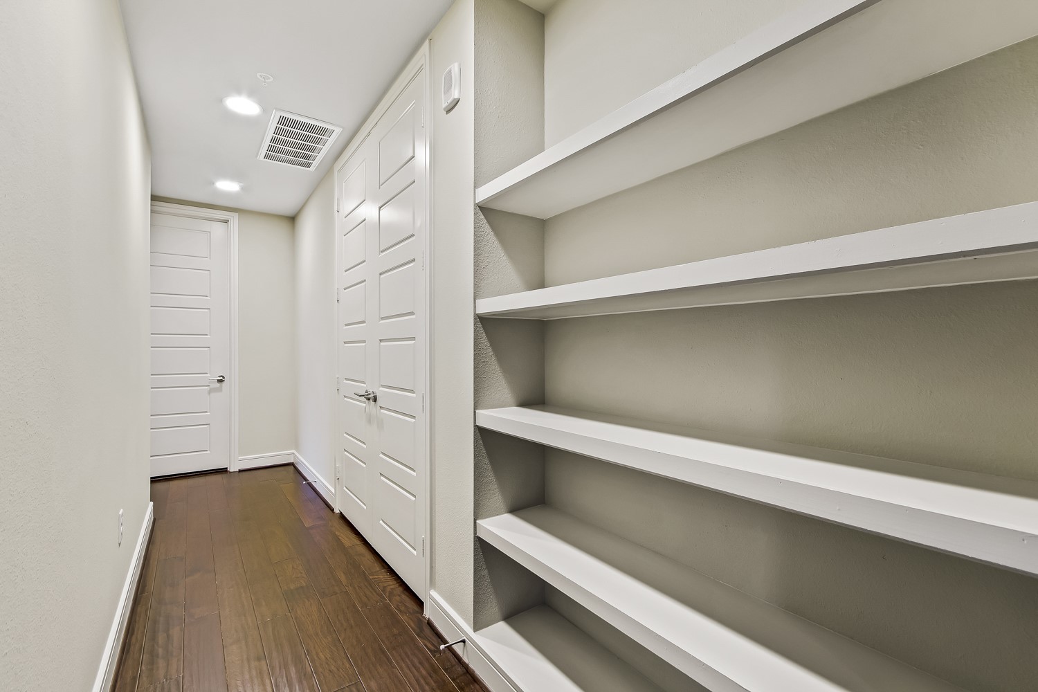 214 Barton Springs Road, Unit 1909 Austin, TX 78704 - Photo 11 of 34 Hall with dark wood-style floors and recessed lighting
