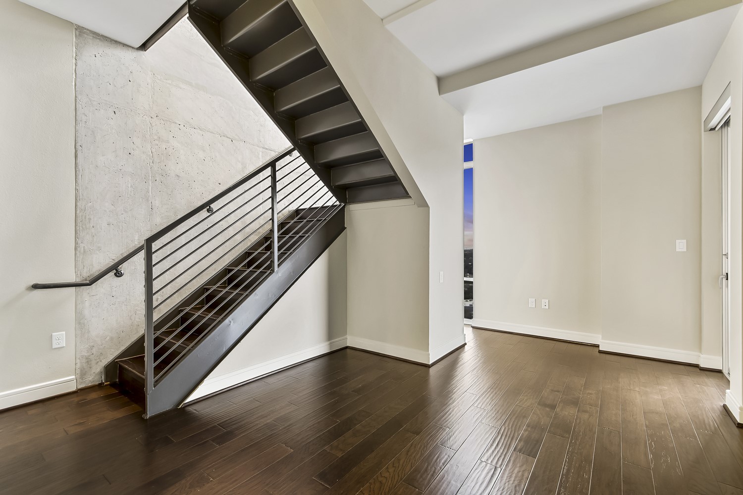 214 Barton Springs Road, Unit 1909 Austin, TX 78704 - Photo 12 of 34 Stairs featuring wood-type flooring and baseboards