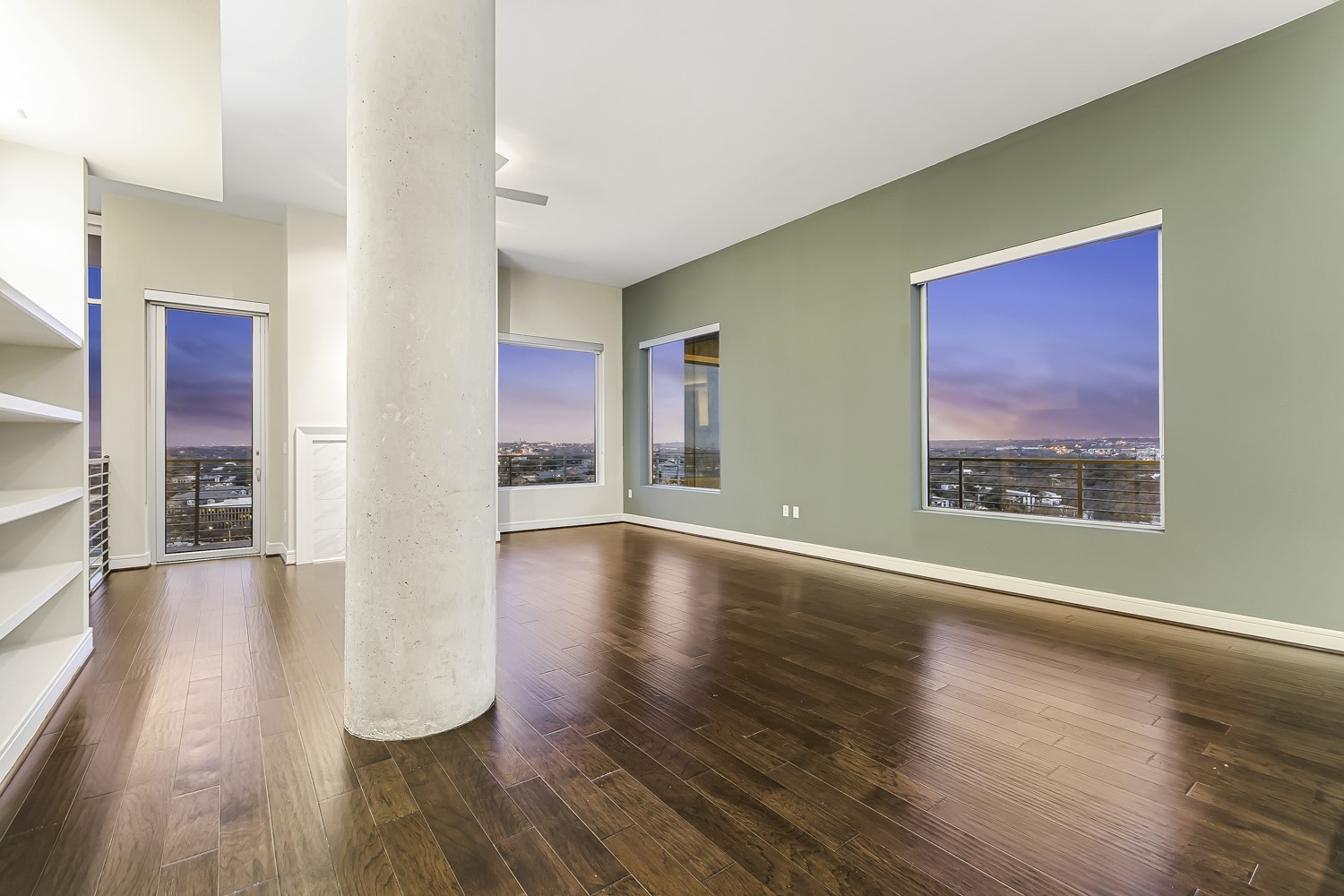 214 Barton Springs Road, Unit 1909 Austin, TX 78704 - Photo 20 of 34 Unfurnished room with dark wood-style floors and baseboards