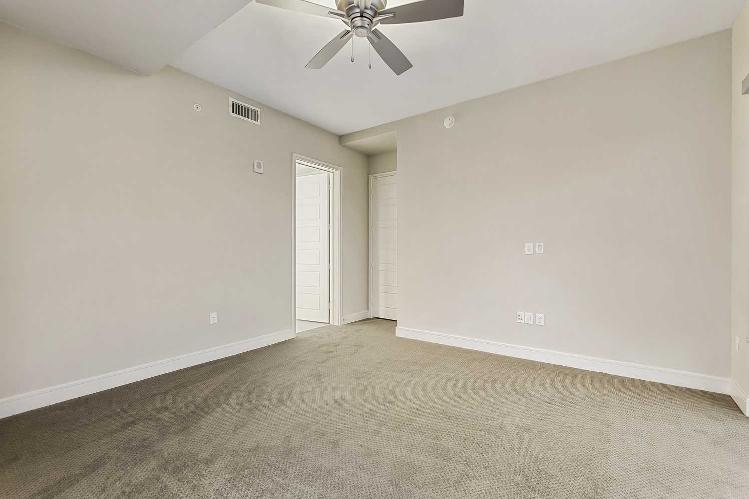 214 Barton Springs Road, Unit 1909 Austin, TX 78704 - Photo 23 of 34 Unfurnished room with light colored carpet and ceiling fan