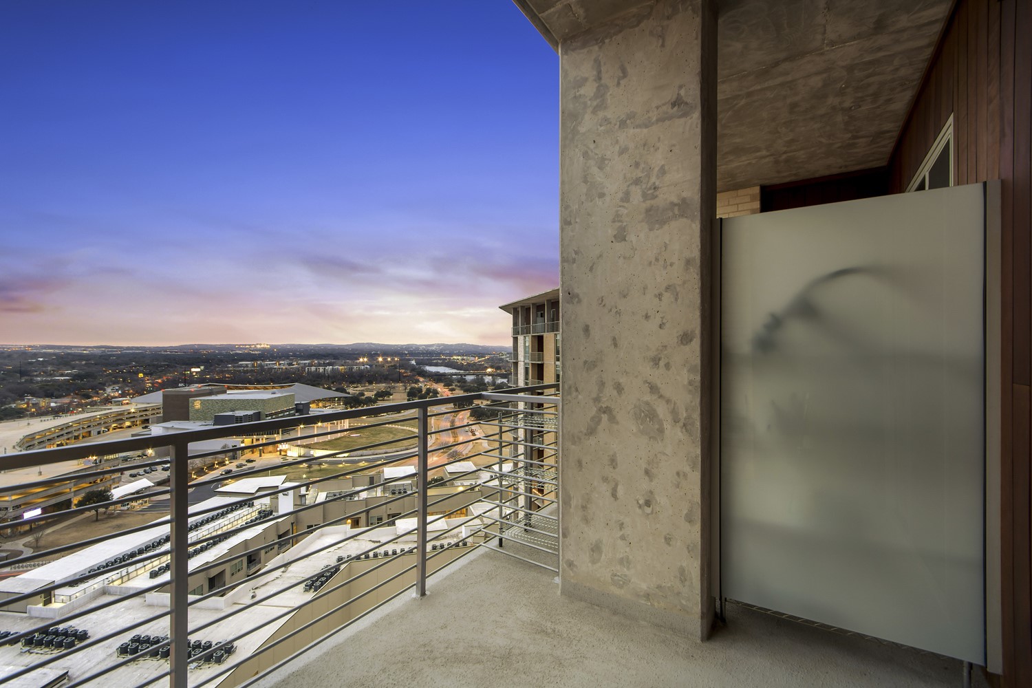 214 Barton Springs Road, Unit 1909 Austin, TX 78704 - Photo 32 of 34 View of balcony at dusk