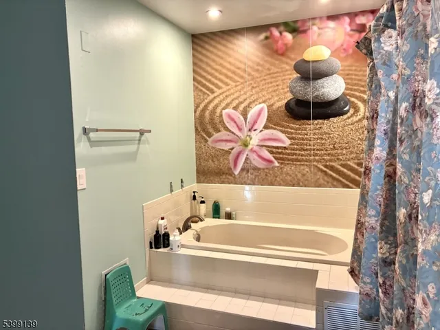 a bathroom with a sink and a bathtub