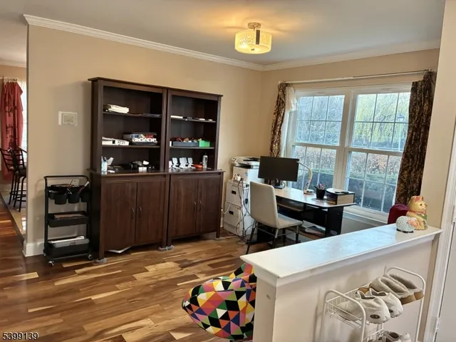 a living room with furniture and window