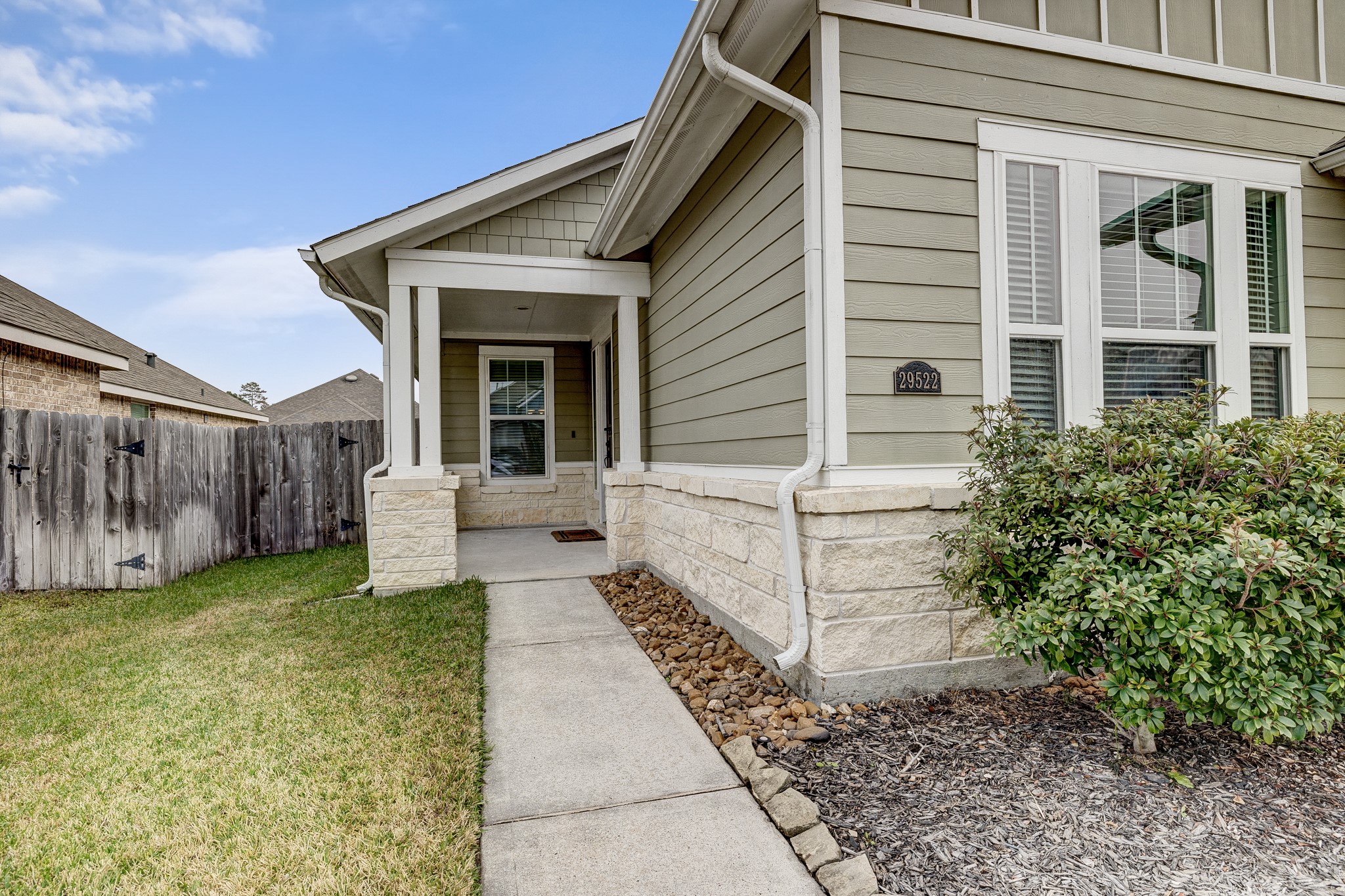 29522 Monona Terrace Court Spring, TX 77386 - Photo 9 of 44 a view of a house with backyard and garden