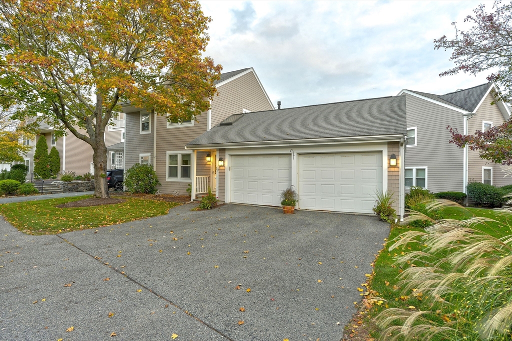 19 Harbourside Road, Unit 19 Quincy, MA 02171 - Photo 1 of 41 a view of a house with backyard and tree