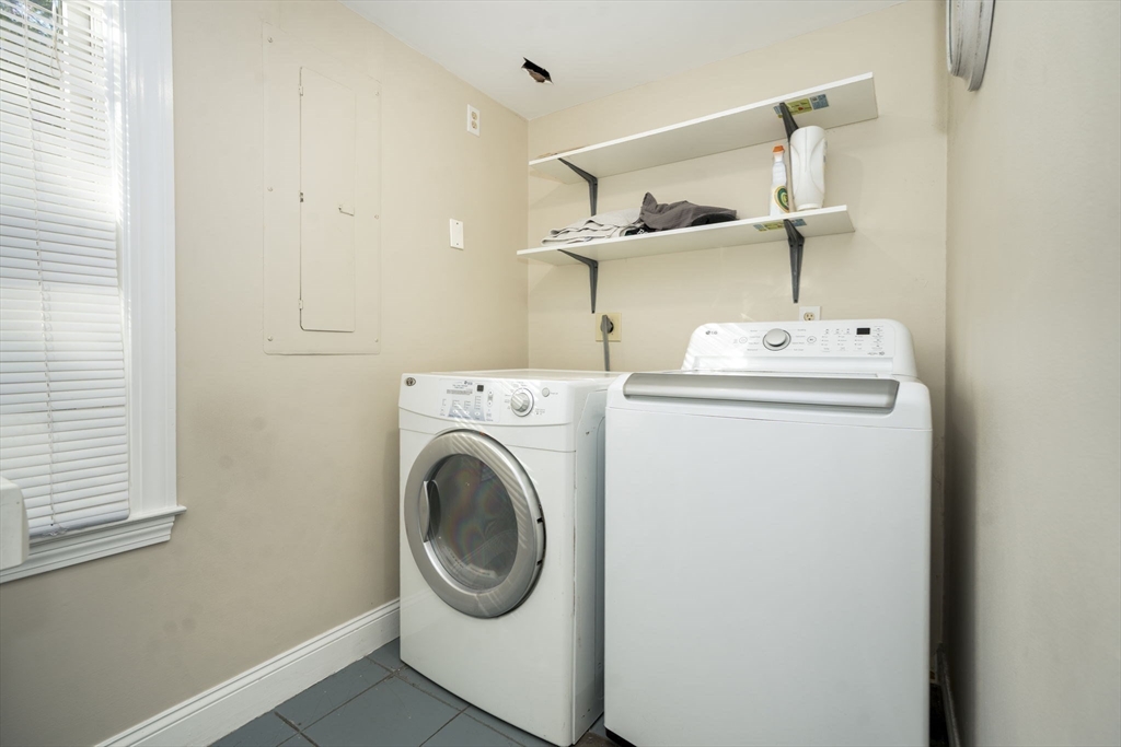 19 Harbourside Road, Unit 19 Quincy, MA 02171 - Photo 11 of 41 a utility room with dryer and washer