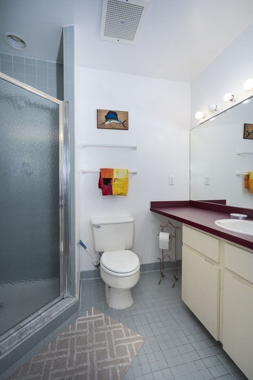 19 Harbourside Road, Unit 19 Quincy, MA 02171 - Photo 24 of 41 a bathroom with a toilet sink and shower