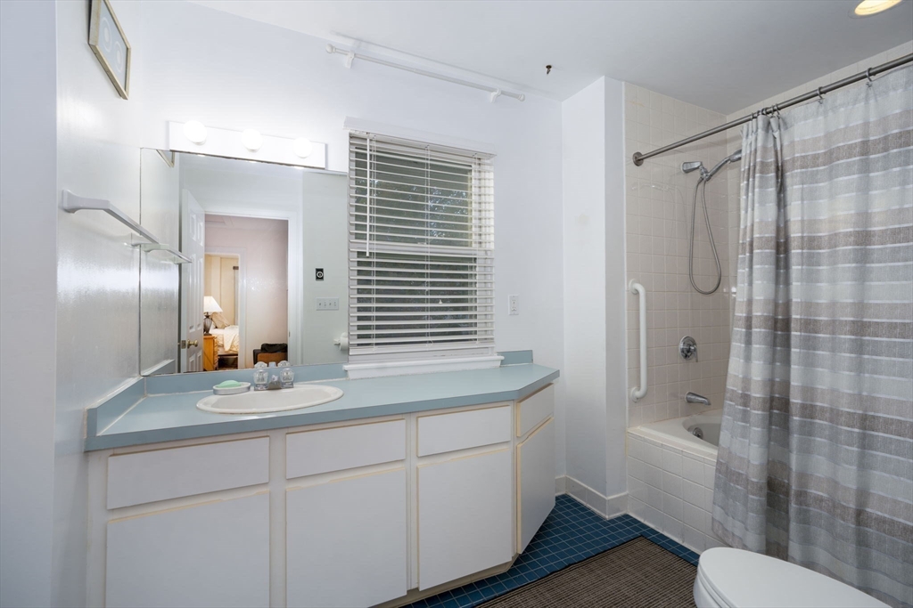 19 Harbourside Road, Unit 19 Quincy, MA 02171 - Photo 27 of 41 a bathroom with a sink a toilet and shower