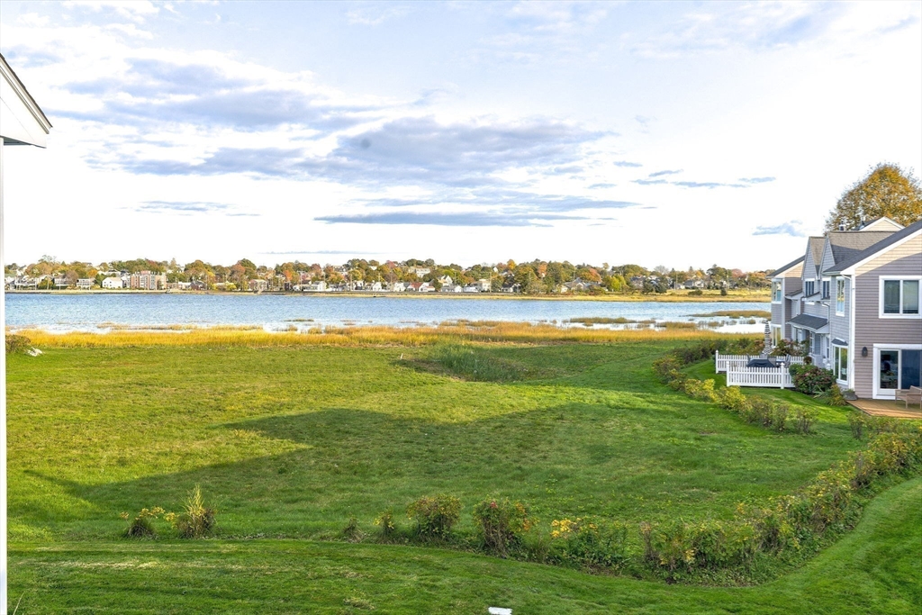 19 Harbourside Road, Unit 19 Quincy, MA 02171 - Photo 31 of 41 a view of an ocean with a city view