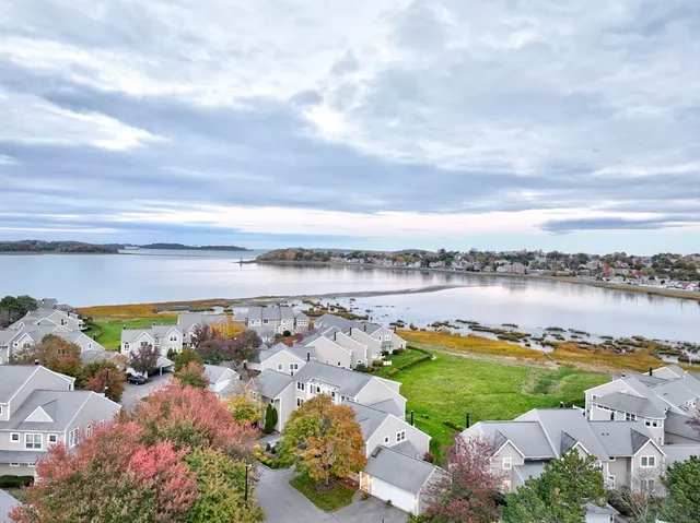 an aerial view of a house with a garden
