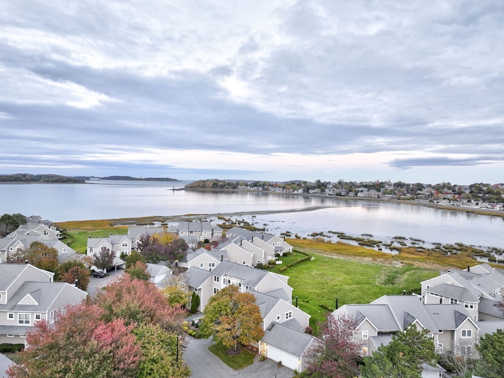 19 Harbourside Road, Unit 19 Quincy, MA 02171 - Photo 34 of 41 a view of a lake with a city