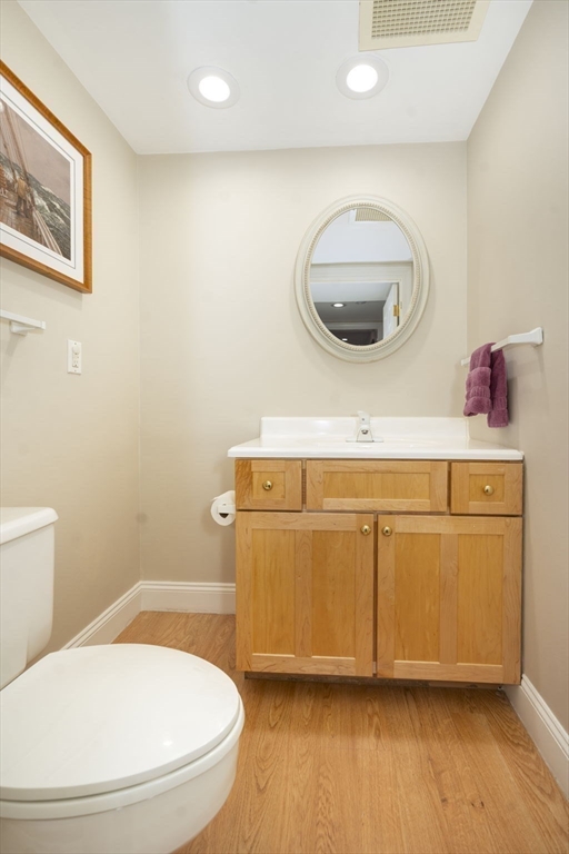 19 Harbourside Road, Unit 19 Quincy, MA 02171 - Photo 10 of 41 a bathroom with a toilet a sink and mirror