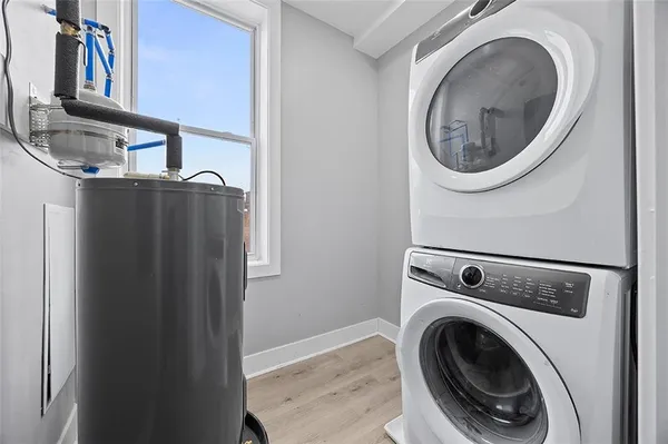 a utility room with dryer and washer