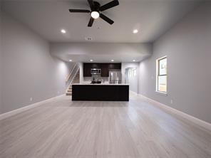 419 West Elm Street Denison, TX 75020 - Photo 2 of 9 a view of a kitchen with a sink and a window